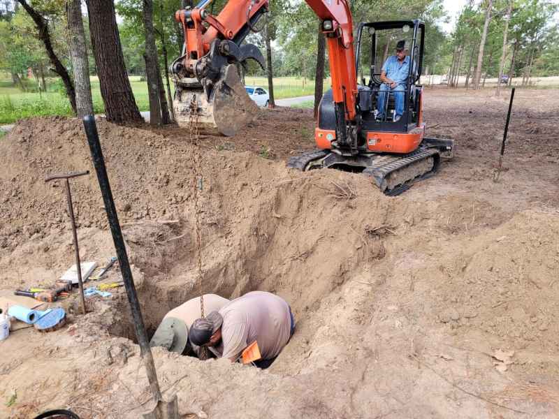 Angelina workers in a hole